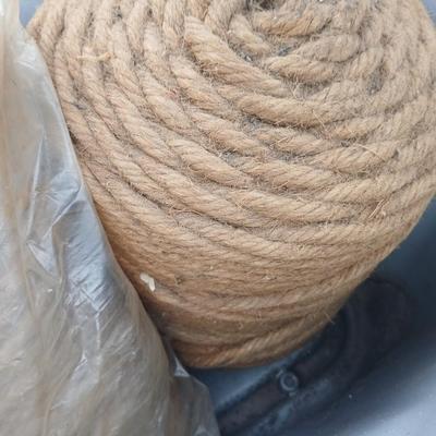 Tote with two rolls of brown toned macramé yarn / twine