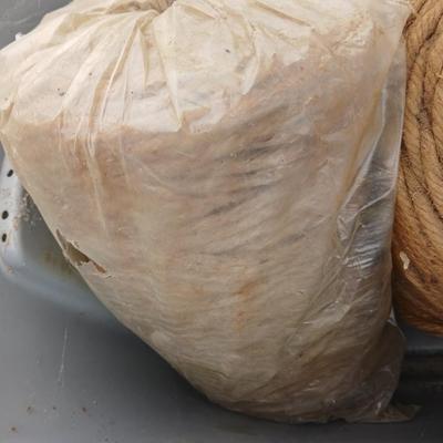 Tote with two rolls of brown toned macramé yarn / twine