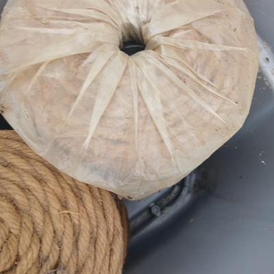 Tote with two rolls of brown toned macramé yarn / twine