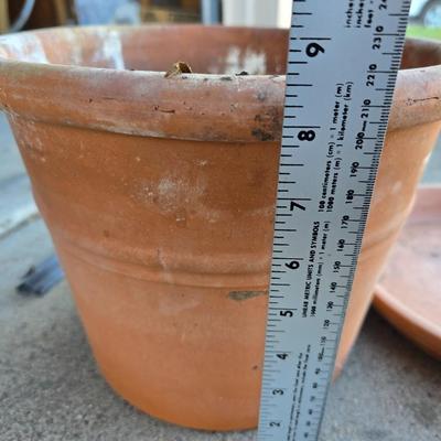 Gardening items - flowerpots - sprinkler - weed eater twine - hand tools - flags - new gate latch - gloves and more