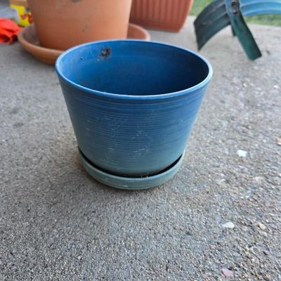 Gardening items - flowerpots - sprinkler - weed eater twine - hand tools - flags - new gate latch - gloves and more