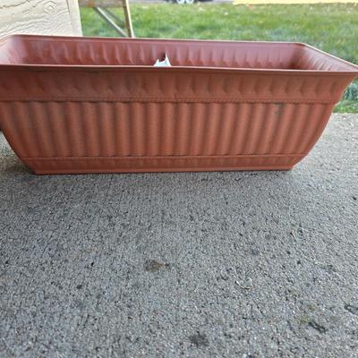 Gardening items - flowerpots - sprinkler - weed eater twine - hand tools - flags - new gate latch - gloves and more