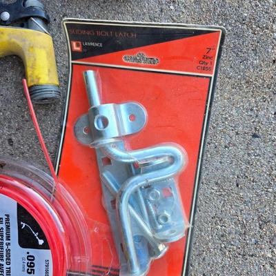 Gardening items - flowerpots - sprinkler - weed eater twine - hand tools - flags - new gate latch - gloves and more