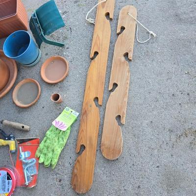Gardening items - flowerpots - sprinkler - weed eater twine - hand tools - flags - new gate latch - gloves and more