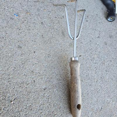 Gardening items - flowerpots - sprinkler - weed eater twine - hand tools - flags - new gate latch - gloves and more