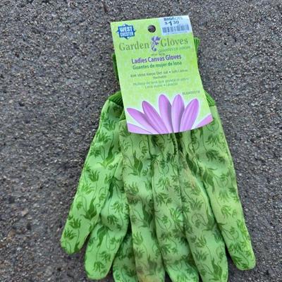 Gardening items - flowerpots - sprinkler - weed eater twine - hand tools - flags - new gate latch - gloves and more