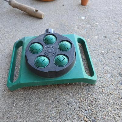 Gardening items - flowerpots - sprinkler - weed eater twine - hand tools - flags - new gate latch - gloves and more