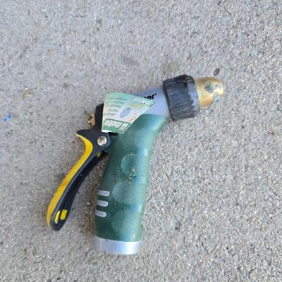 Gardening items - flowerpots - sprinkler - weed eater twine - hand tools - flags - new gate latch - gloves and more