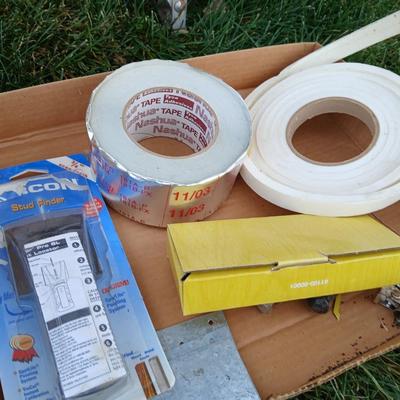 Ladder with an assortment of home repair items