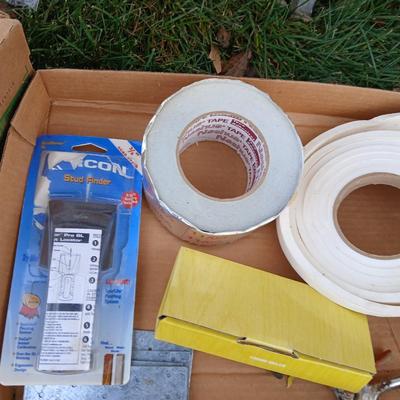 Ladder with an assortment of home repair items