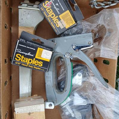 Ladder with an assortment of home repair items