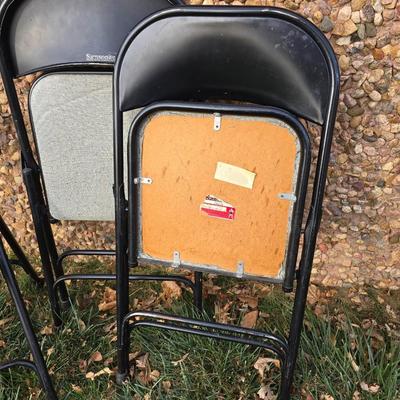 Six metal folding chairs