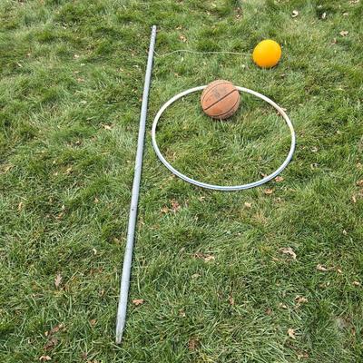 Tetherball on short pole, basketball and a hoola hoop