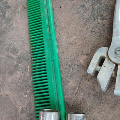 Livestock items - dehorner - trimmers - tagger - assortment of brushes and more