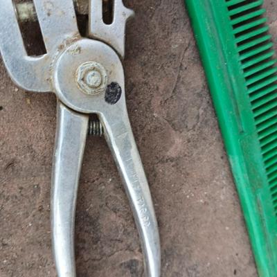 Livestock items - dehorner - trimmers - tagger - assortment of brushes and more