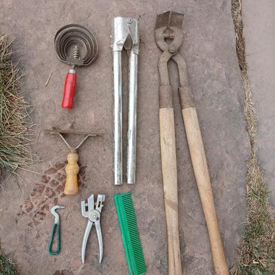 Livestock items - dehorner - trimmers - tagger - assortment of brushes and more