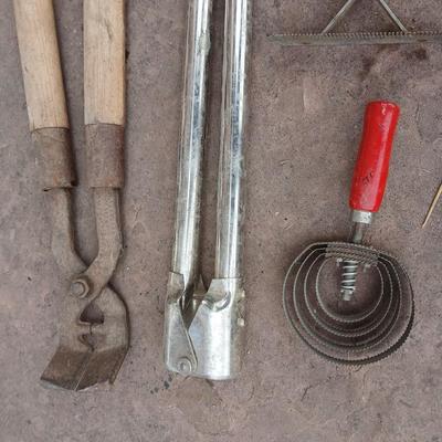 Livestock items - dehorner - trimmers - tagger - assortment of brushes and more