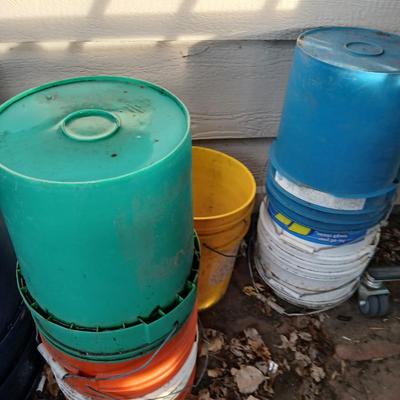assortment of 5-gallon buckets