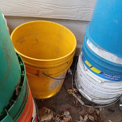 assortment of 5-gallon buckets