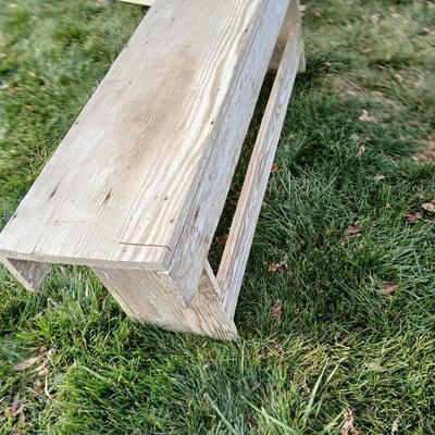 Two old wooden benches that are quite sturdily built!