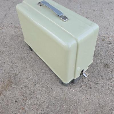 Vintage Sears Kenmore sewing machine with small tote of sewing supplies