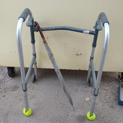 Mobility walker with a London fog umbrella