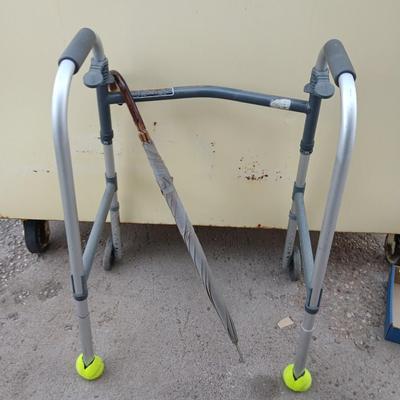 Mobility walker with a London fog umbrella