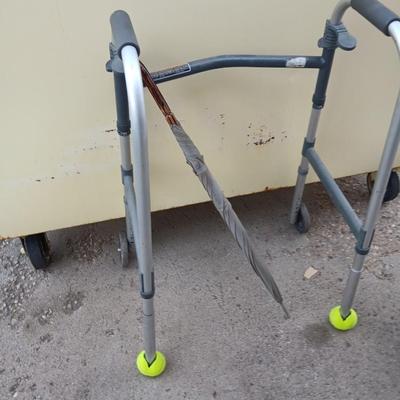 Mobility walker with a London fog umbrella