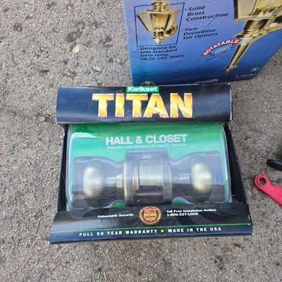 New titan doorknob, new mailbox, new porch light and adjustable window screens