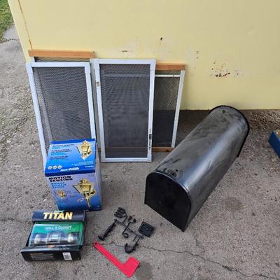 New titan doorknob, new mailbox, new porch light and adjustable window screens