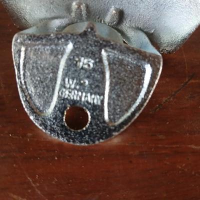 New CocaCola Starr bottle opener with a collection of glass Santa & Broncos coke bottles