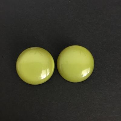 Vintage, green moonglow clip on earrings