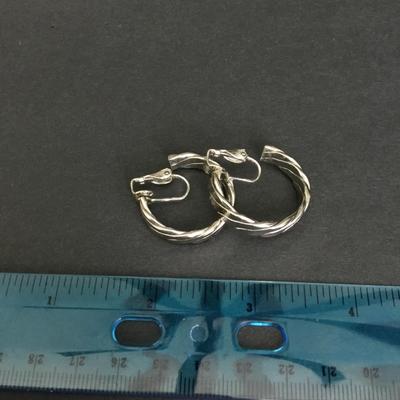 Beautiful, vintage, silver toned hoop clip on earrings