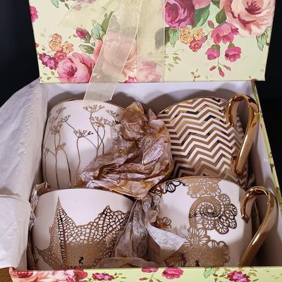 LOT 229: Gilded Pink Depression Glass Bowl, Studio Tu Mugs, Silver-Tone Metal Holly Candlestick Holder & More