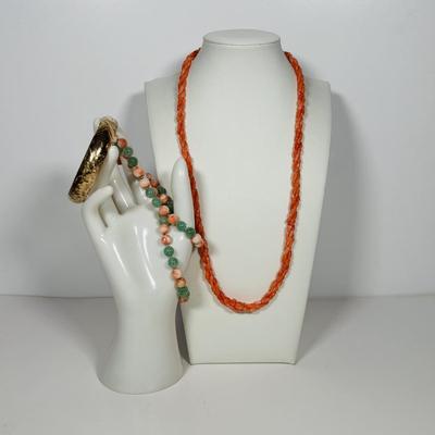 LOT 272: Pink Tourmaline & Jade Bead Necklace w/14K Clasp, 3 Strand Beaded Coral Necklace w/14K Clasp & Gold Tone Bangle Bracelet