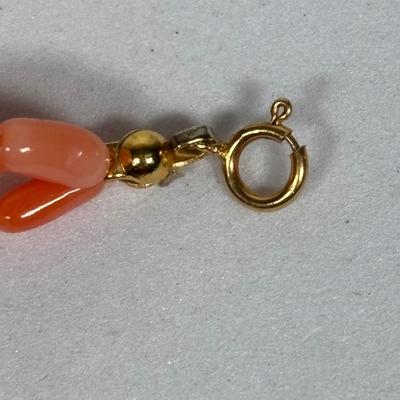 LOT 272: Pink Tourmaline & Jade Bead Necklace w/14K Clasp, 3 Strand Beaded Coral Necklace w/14K Clasp & Gold Tone Bangle Bracelet