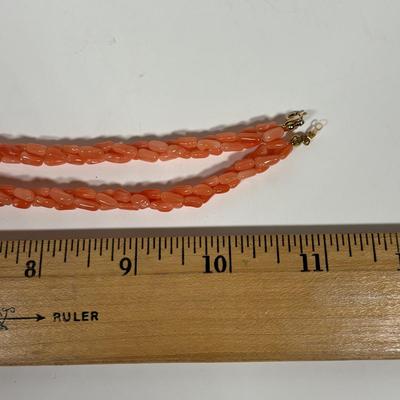 LOT 272: Pink Tourmaline & Jade Bead Necklace w/14K Clasp, 3 Strand Beaded Coral Necklace w/14K Clasp & Gold Tone Bangle Bracelet