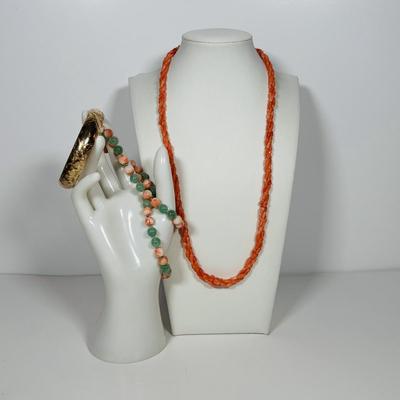 LOT 272: Pink Tourmaline & Jade Bead Necklace w/14K Clasp, 3 Strand Beaded Coral Necklace w/14K Clasp & Gold Tone Bangle Bracelet