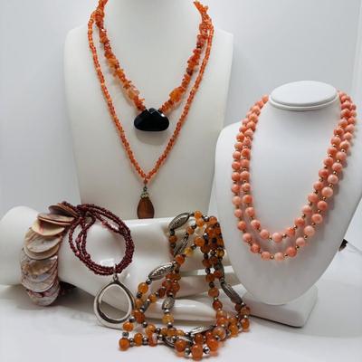 LOT 257: Beaded Necklace Collection w/a Natural Shell Stretch Braccelet