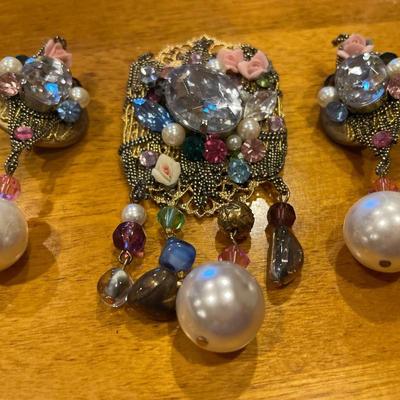 Multi colored embellished brooch and earrings