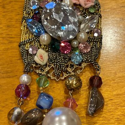 Multi colored embellished brooch and earrings