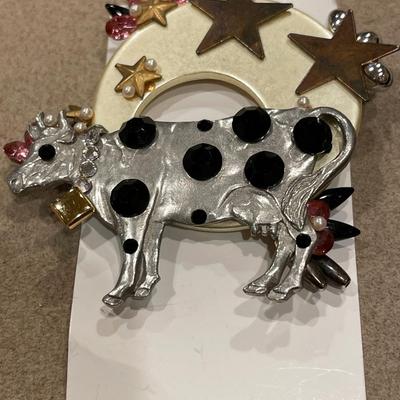 Multicolor rhinestone cow and howling wolf pin