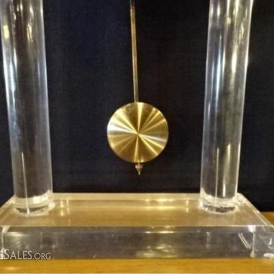LOT 100D: LUCITE AND BRASS CLOCK