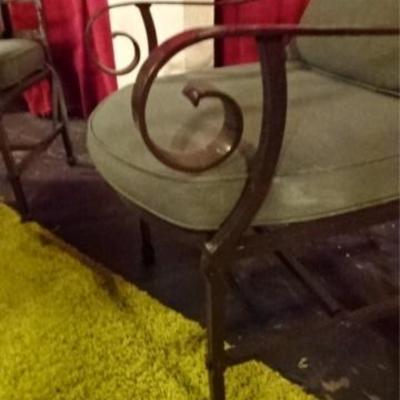 LOT 40A: 7 PC CAST STONE PATIO TABLE AND 6 METAL ARMCHAIRS