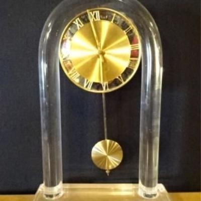 LOT 100D: LUCITE AND BRASS CLOCK