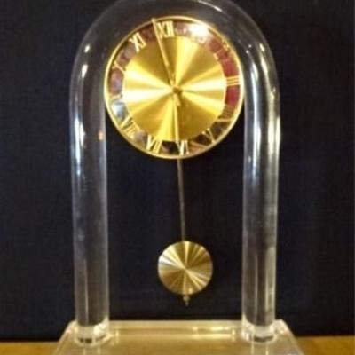 LOT 100D: LUCITE AND BRASS CLOCK