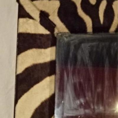 LOT 51C: ZEBRA PRINT NATURAL STEER HIDE FRAMED MIRROR