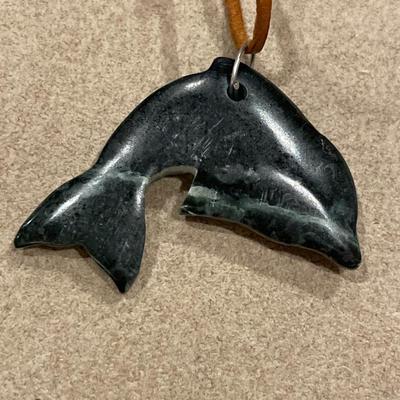 Green stone dolphin and jade ring