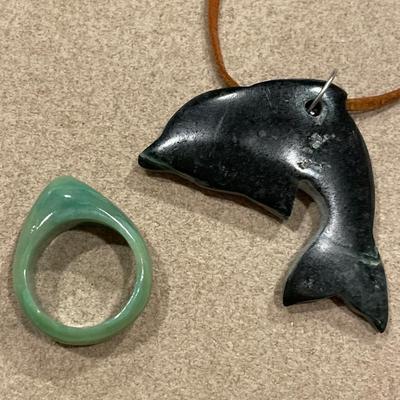 Green stone dolphin and jade ring