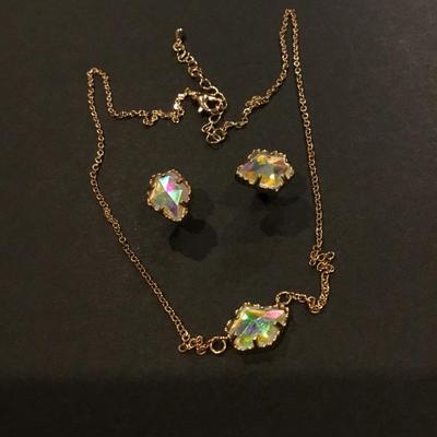Beautiful gold tone, iridescent, rhinestone, studded earrings, and matching necklace. Very beautiful.